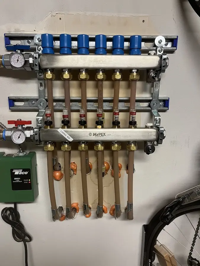 Plumber performing Water Heater Repair at a residential property in Caldwell